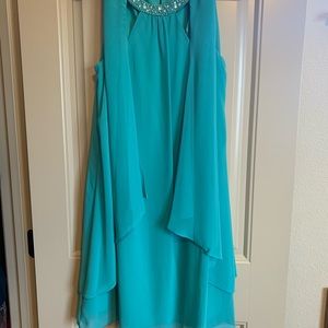 Woman’s sleeveless formal dress size 14